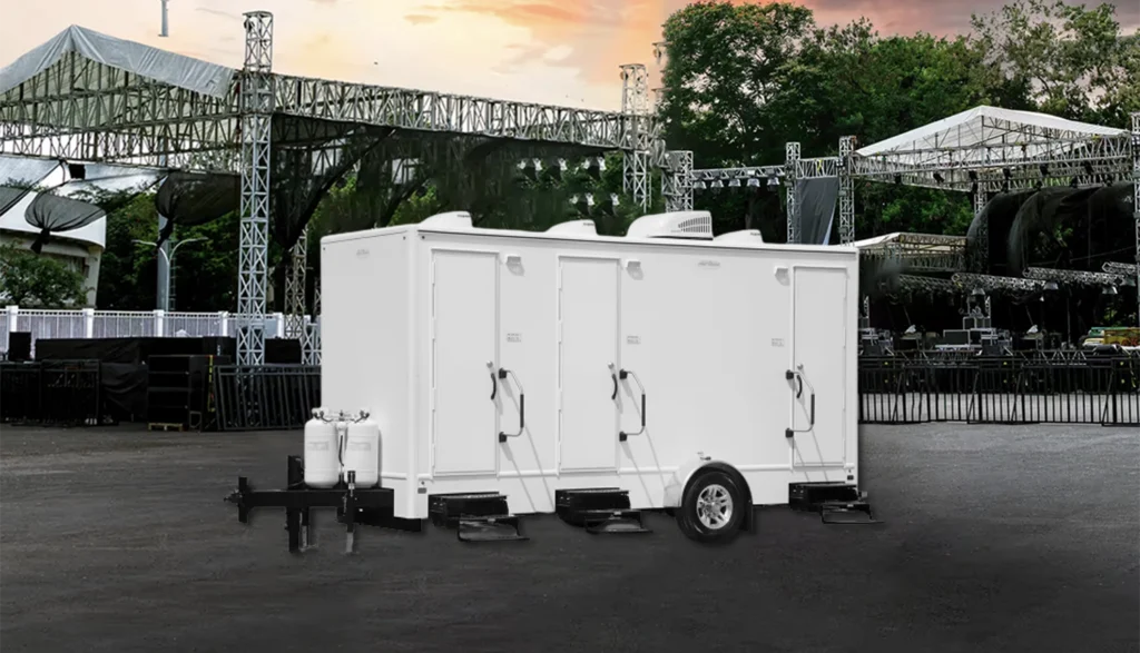3-Door Combo Trailer in a parking lot at a music festival outdoor event