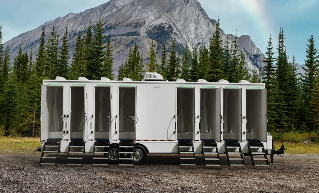 8 Station (8 Door) Shower Trailer on a Disaster Relief site in the woods