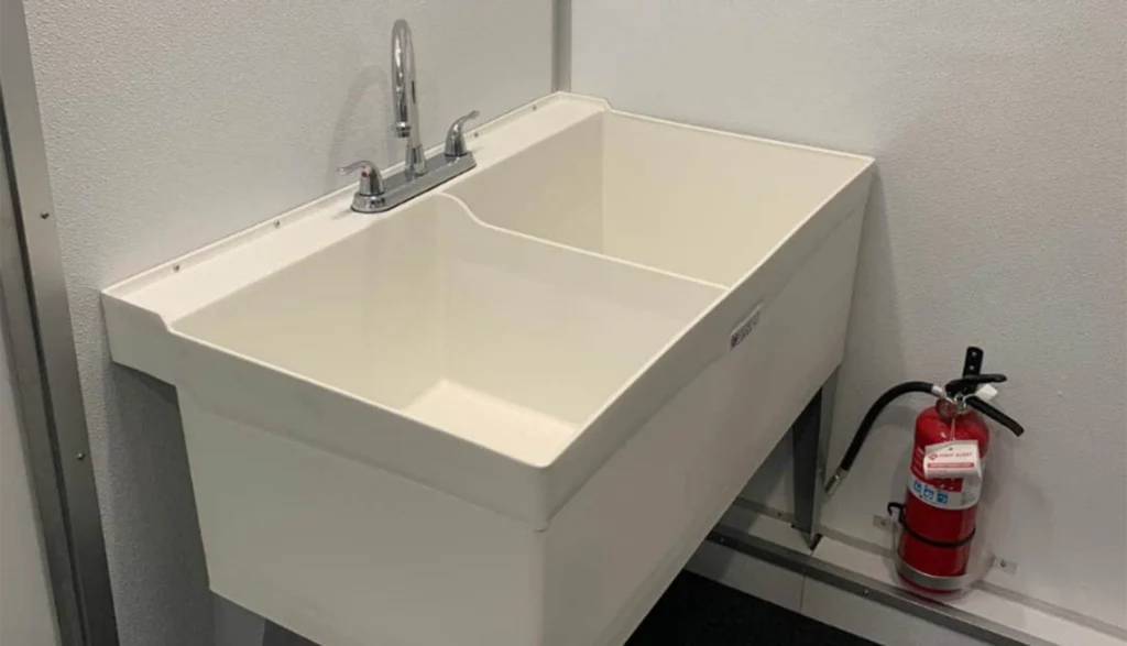 Washing station inside an 8-station laundry trailer